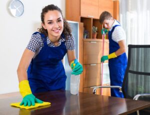 A professional cleaning team in London preparing a rental property for handover.